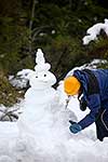 Snow man building