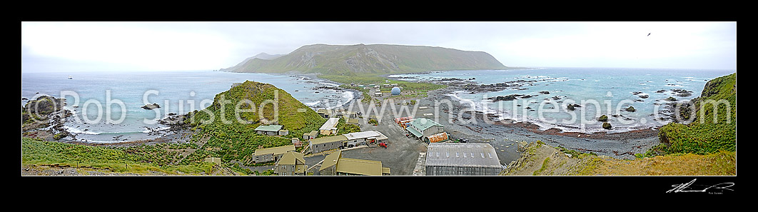 Image of ANARE station on isthmus at Macquarie Island from Wireless Hill. Buckles Bay left, Hasselborough Bay right, Macquarie Island, NZ Sub Antarctic District, NZ Sub Antarctic Region, Australia stock photo image