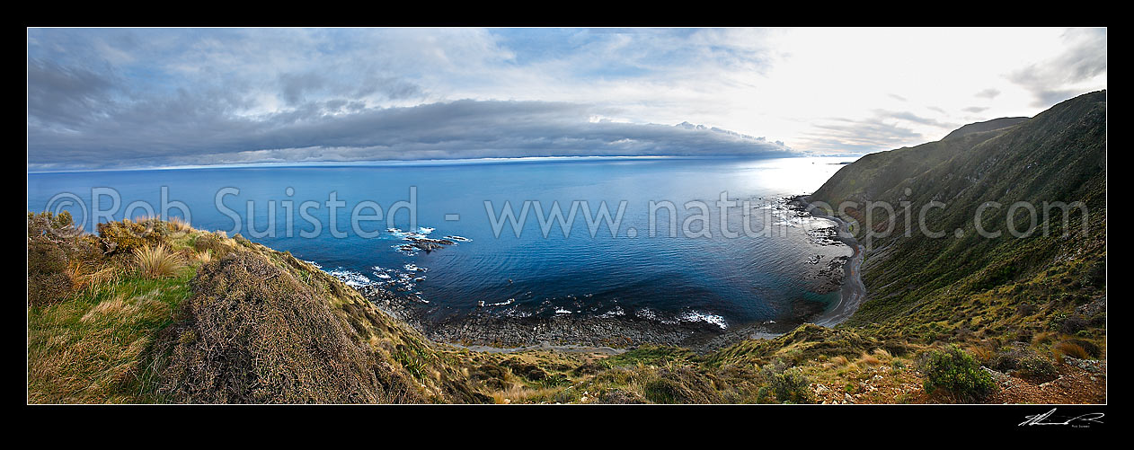 Image of Panorama across Cook Strait to South Island with southerly storm front approaching the Wellington South Coast above Sinclair Head, Red Rocks., Wellington, Wellington City District, Wellington Region, New Zealand (NZ) stock photo image