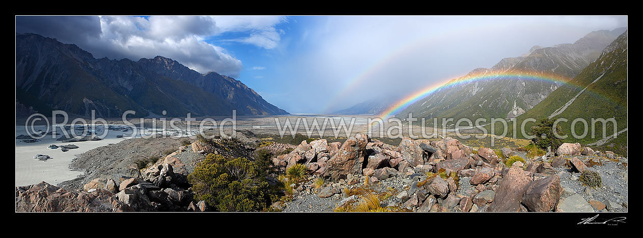 Image of Panorama view of Tasman Valley and double rainbows from lateral morraine. Glacier terminal lake and Burnett mountains left, Mount Cook Range right, Mount Cook, MacKenzie District, Canterbury Region, New Zealand (NZ) stock photo image