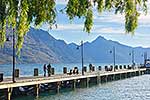 People walking along jetty