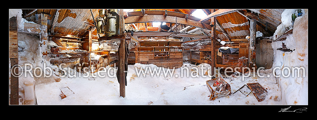 Image of Mawson's Hut interior panorama. Australian Sir Douglas Mawson's Hut main room (1912-1914). Acetyline generator left top, Frank Hurley's bunk and darkroom at right. Cape Denison. Panorama taken from door, Commonwealth Bay, Antarctica stock photo image