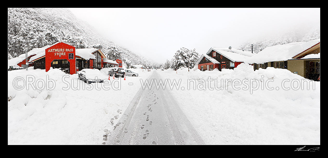 Image of Arthur's Pass township in heavy winter snow. State Highway 73 to West Coast. Panorama, Arthur's Pass National Park, Selwyn District, Canterbury Region, New Zealand (NZ) stock photo image