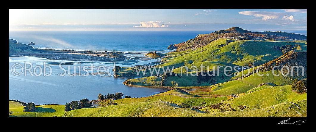 Image of Otago Peninsula farmland and beaches around Hoopers Inlet. Allans Beach left, Sandy Mount right. Panorama, Otago Peninsula, Dunedin City District, Otago Region, New Zealand (NZ) stock photo image