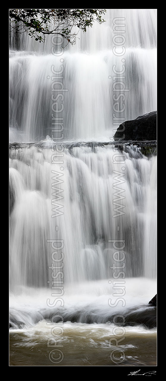 Image of Waterfall cascading over several falls into pool. Purakaunui River falls. Massive vertical panorama file, Catlins, Clutha District, Otago Region, New Zealand (NZ) stock photo image