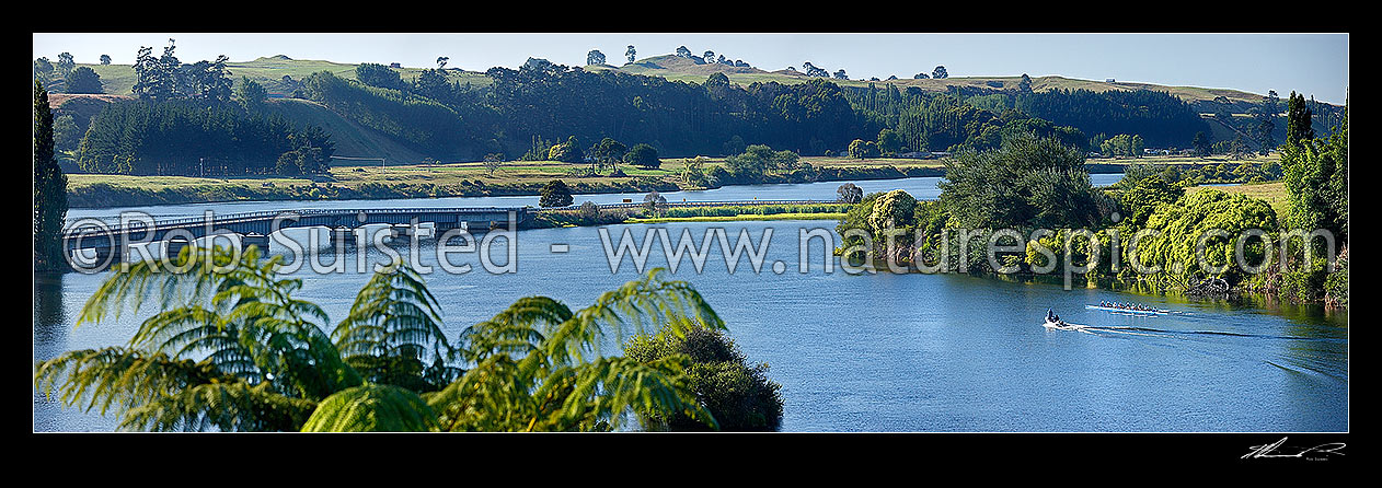 Image of Lake Karapiro with rowing teams of rowers training on lake with support boats and coaches. Panorama, Lake Karapiro, Cambridge, Waipa District, Waikato Region, New Zealand (NZ) stock photo image