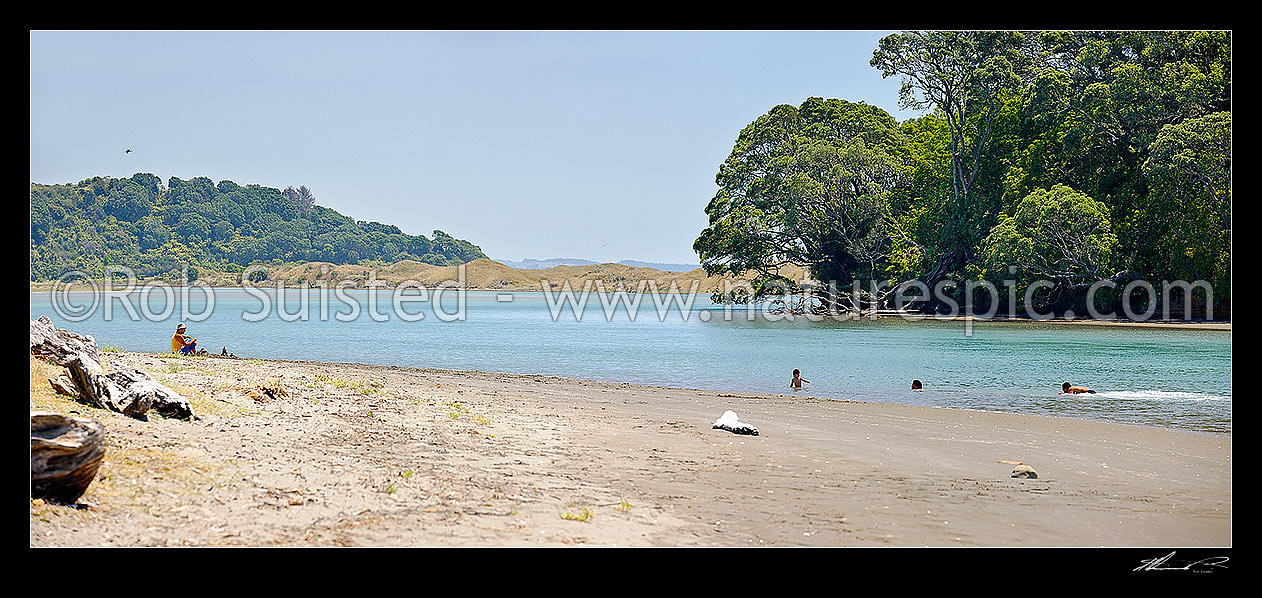 Image of Waiotahi River panorama, with family enjoying summer swimming at river mouth on the Bay of Plenty coastline, Waiotahi River, Ohiwa, Opotiki District, Bay of Plenty Region, New Zealand (NZ) stock photo image