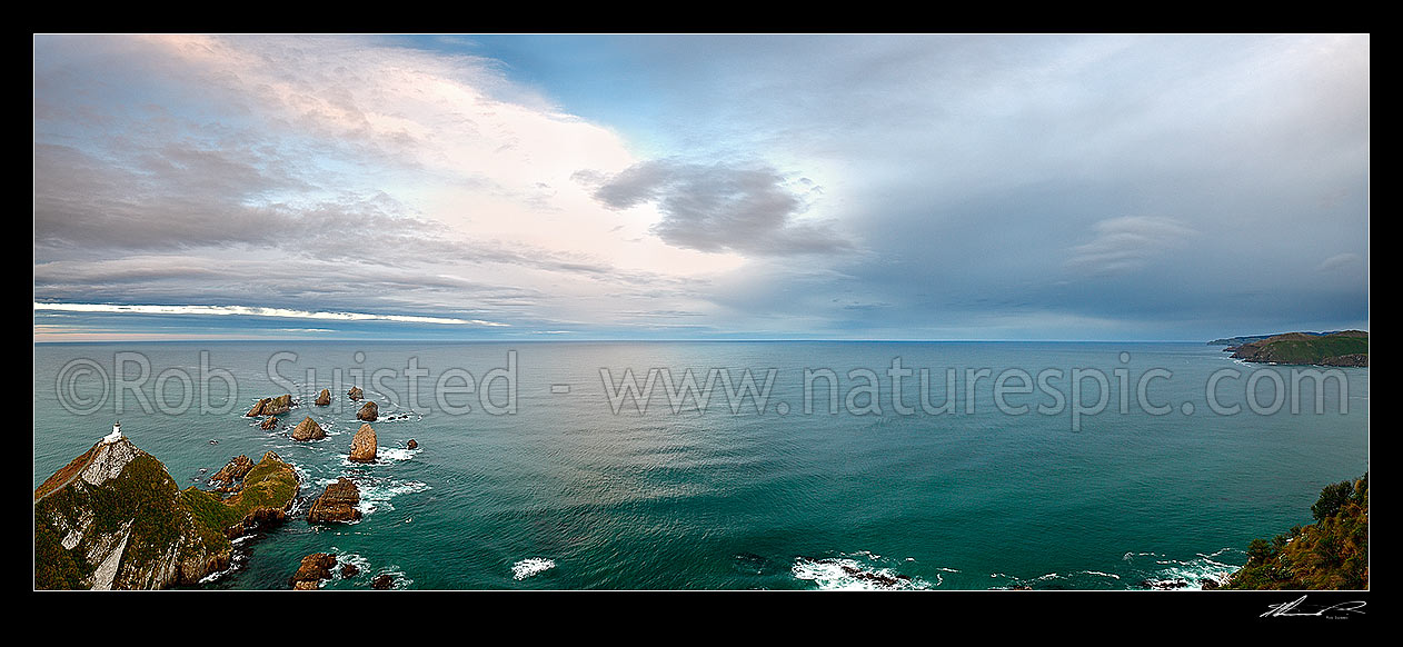 Image of Nuggets Lighthouse at dusk. Nugget point and Tokata Point left, and south towards Long Point (right), South Otago Panorama, Catlins, Clutha District, Otago Region, New Zealand (NZ) stock photo image