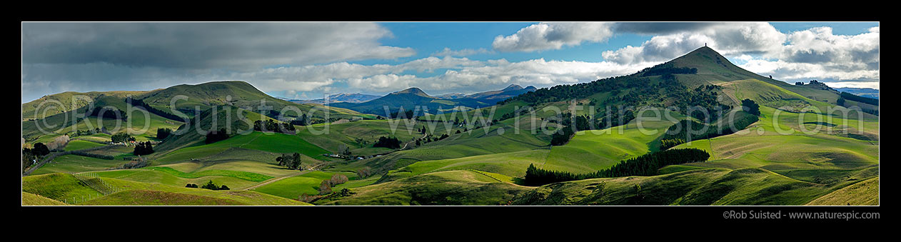 Image of North Otago farmland at Goodwood with Puketapu Hill (344m) right with Sir John McKenzie Monument. Panorama, Palmerston, Waitaki District, Canterbury Region, New Zealand (NZ) stock photo image