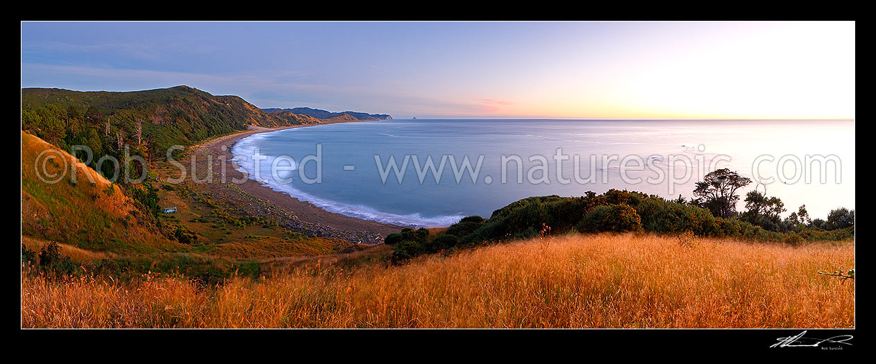 Image of Port Awanui and Te Wharau Beach pre dawn sunrise. East Cape and East Island (Whangaokeno) visible in distance. Panorama, Port Awanui, East Coast, Gisborne District, Gisborne Region, New Zealand (NZ) stock photo image