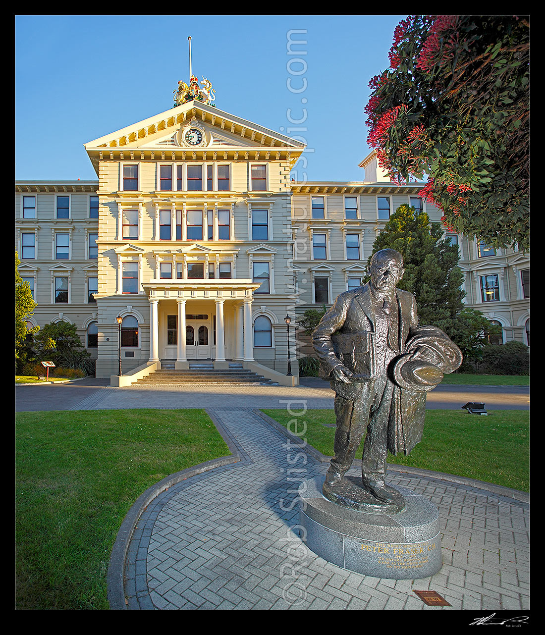 Image of Historic Old Government Buildings, with The Right Honourable Peter Fraser statue. Completed 1876, largest wooden building in Southern Hemisphere, 2nd in world, Wellington, Wellington City District, Wellington Region, New Zealand (NZ) stock photo image