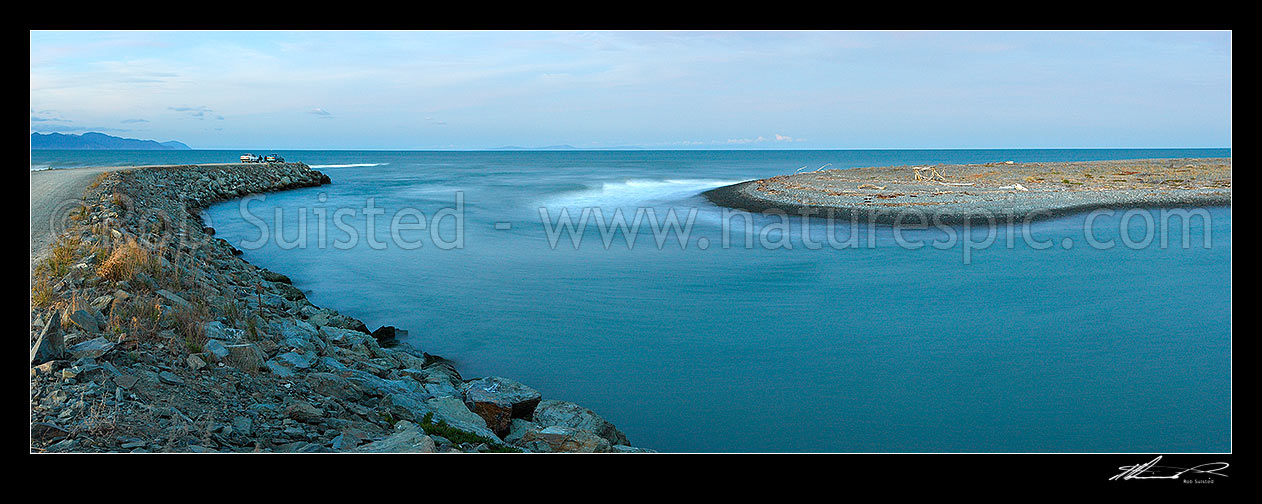 Image of Wairau River mouth and bar panorama. Cars and fishermen fishing at dusk. Cloudy Bay and North Island beyond, Blenheim, Marlborough District, Marlborough Region, New Zealand (NZ) stock photo image