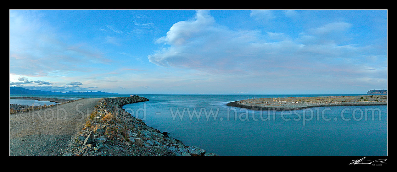 Image of Wairau River mouth and bar panorama. Cars and fishermen fishing at dusk. Cloudy Bay and North Island beyond. White Bluffs / Te Parinui o Whiti far right, Blenheim, Marlborough District, Marlborough Region, New Zealand (NZ) stock photo image