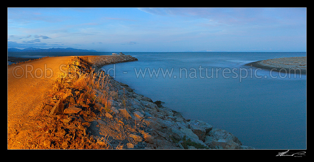 Image of Wairau River mouth and bar panorama. Cars and fishermen fishing at dusk. Cloudy Bay and North Island beyond, Blenheim, Marlborough District, Marlborough Region, New Zealand (NZ) stock photo image