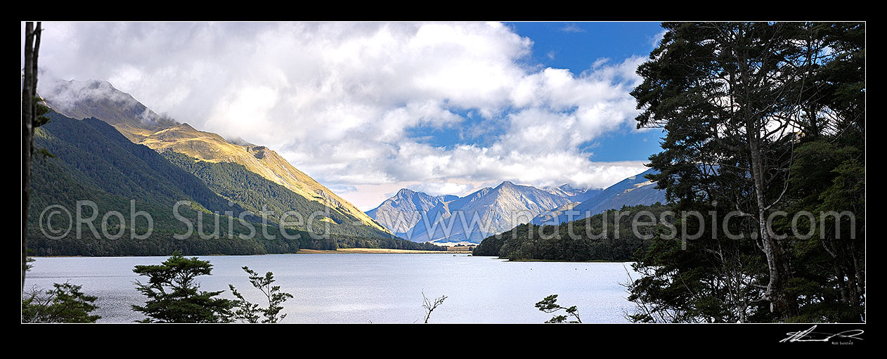 Image of South Mavora Lake nestled between the Livingstone and Thomson Mountains ranges. Snowdon Forest Conservation Area & Mararoa River Valley panorama, Mavora Lakes, Te Anau, Southland District, Southland Region, New Zealand (NZ) stock photo image