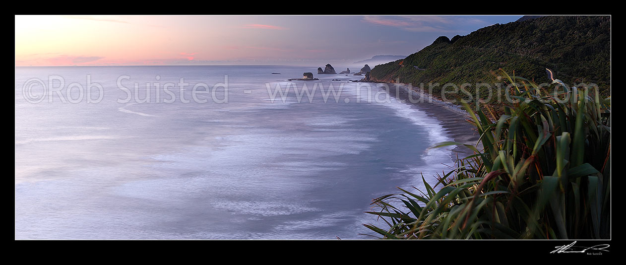 Image of Rugged West Coast coastline near Motukiekie Rocks (Ten Mile Creek / Waianiwaniwa) at sunset. Paparoa Ranges beyond, Rapahoe, Grey District, West Coast Region, New Zealand (NZ) stock photo image