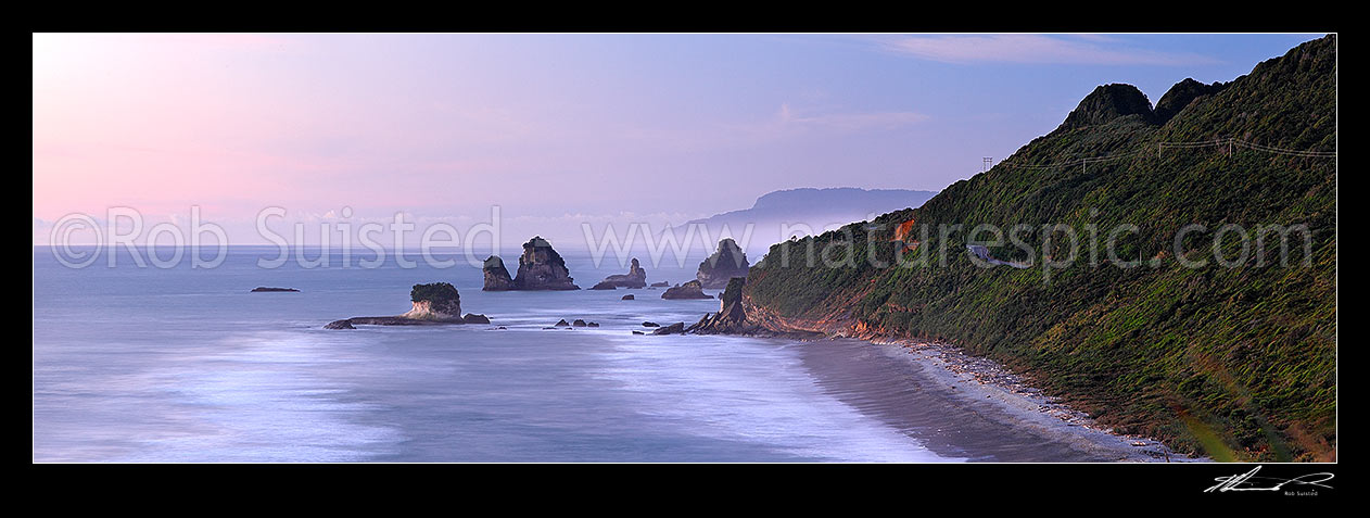 Image of Rugged West Coast coastline near Motukiekie Rocks (Ten Mile Creek / Waianiwaniwa) at sunset. Paparoa Ranges beyond, Rapahoe, Grey District, West Coast Region, New Zealand (NZ) stock photo image