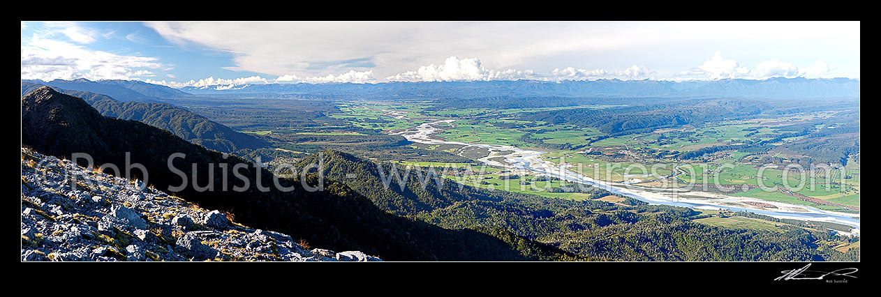 Image of Grey River valley panorama with towns of Blackball, Ahaura, Nelson Creek, Ngahere, below the Paparoa Range (left). Victoria Range distant right, Grey Valley, Grey District, West Coast Region, New Zealand (NZ) stock photo image