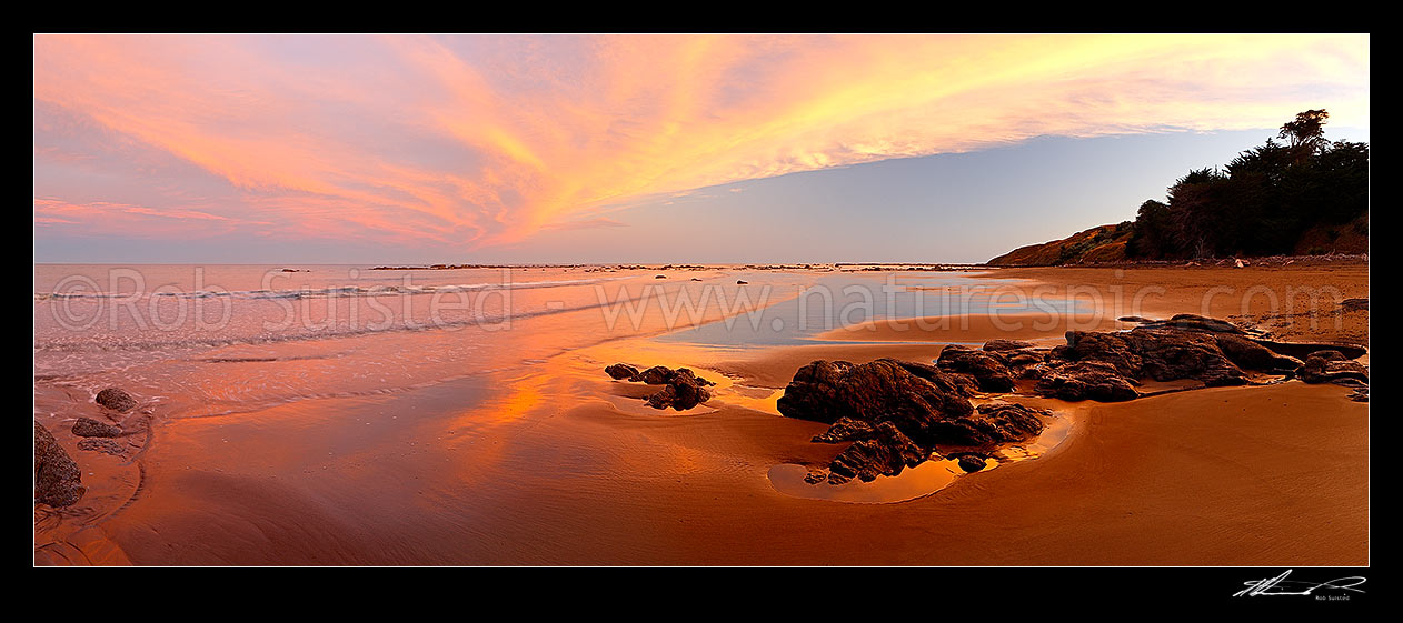 Image of Port Awanui sunset panorama at beach near East Cape, East Coast, Port Awanui, East Coast, Gisborne District, Gisborne Region, New Zealand (NZ) stock photo image