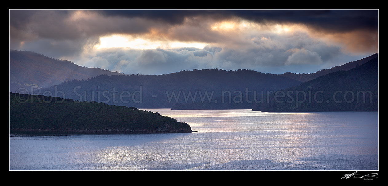 Image of Marlborough Sounds and moody sunset over Queen Charlotte Sound. Waikawa Bay and The Snout left, Lochmara Bay and Double cove centre, Marlborough Sounds, Marlborough District, Marlborough Region, New Zealand (NZ) stock photo image