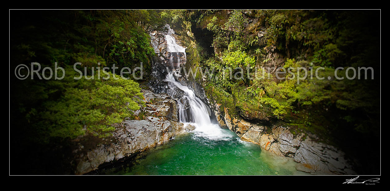 Image of Christie Falls. Falls Creek waterfalls in the Hollyford River Valley, enroute to Milford Sound; panorama with selective focus and vignetting, Fiordland National Park, Southland District, Southland Region, New Zealand (NZ) stock photo image