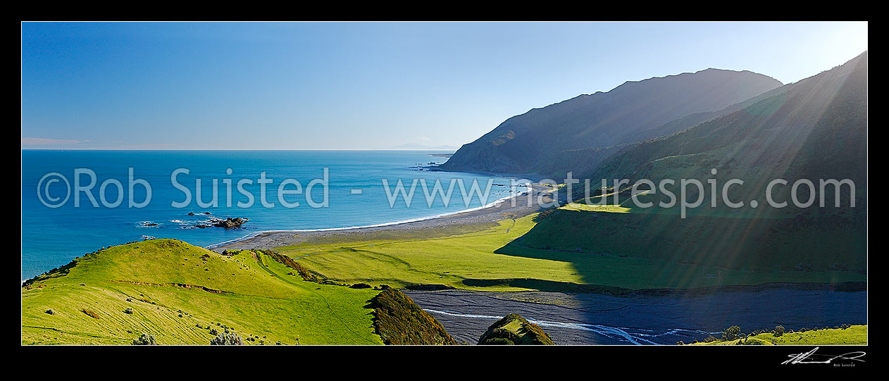 Image of Mukamuka Stream entering Palliser Bay from the Remutaka (Rimutaka) Forest Park. Windy Point centre, and South Island in distance. Panorama, Palliser Bay, South Wairarapa District, Wellington Region, New Zealand (NZ) stock photo image