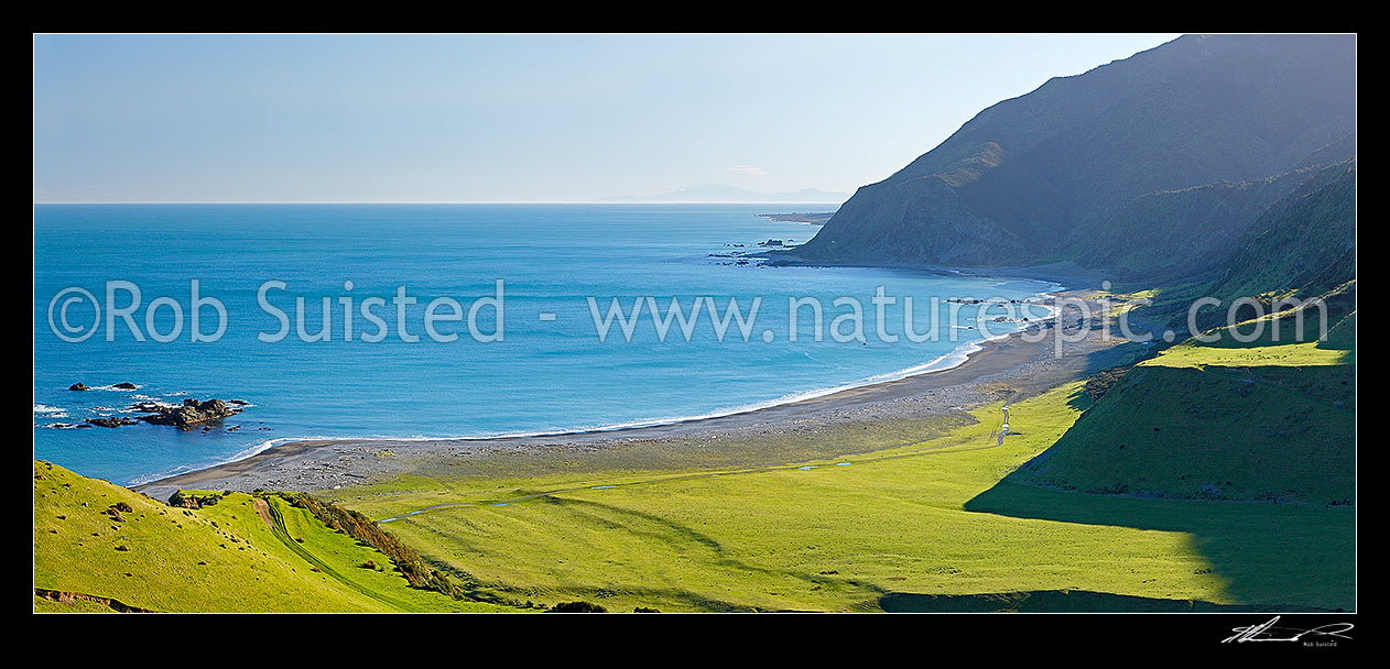 Image of Mukamuka Stream entering Palliser Bay from the Remutaka (Rimutaka) Forest Park. Windy Point centre, and South Island in distance. Panorama, Palliser Bay, South Wairarapa District, Wellington Region, New Zealand (NZ) stock photo image