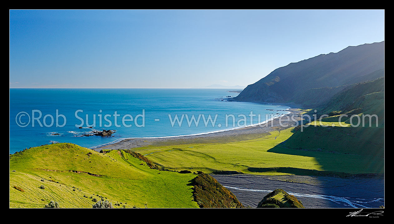 Image of Mukamuka Stream entering Palliser Bay from the Remutaka (Rimutaka) Forest Park. Windy Point centre, and South Island in distance. Panorama, Palliser Bay, South Wairarapa District, Wellington Region, New Zealand (NZ) stock photo image