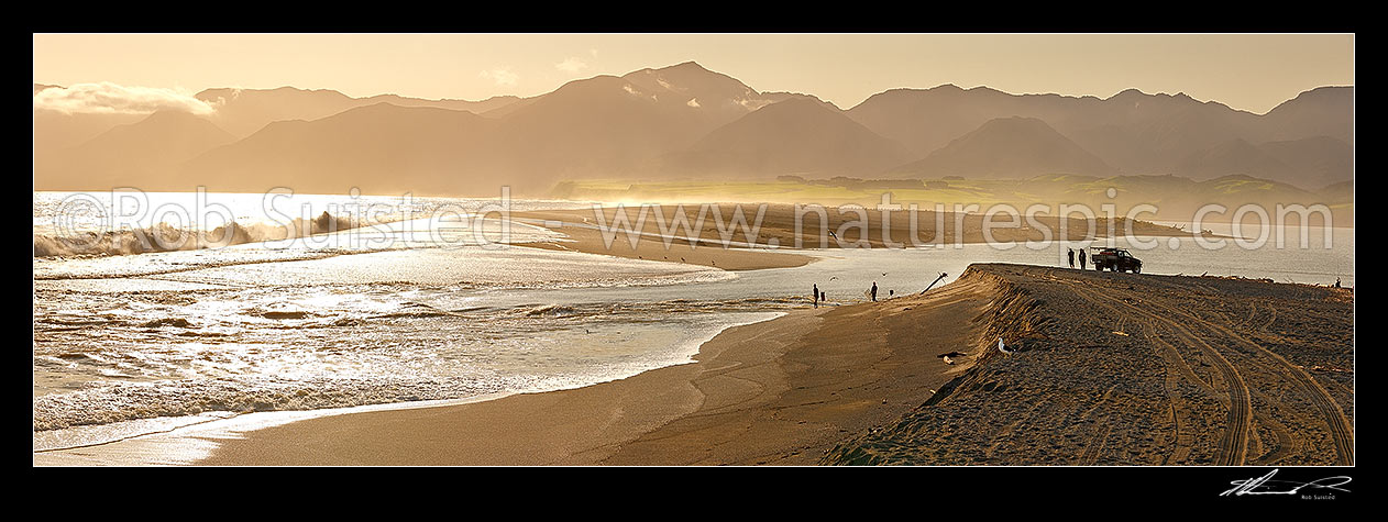 Image of Lake Onoke entrance and Ruamahanga River mouth in Palliser Bay with fishermen and whitebaiters in evening. Remutaka (Rimutaka) Ranges beyond. Panorama, Lake Ferry, South Wairarapa District, Wellington Region, New Zealand (NZ) stock photo image