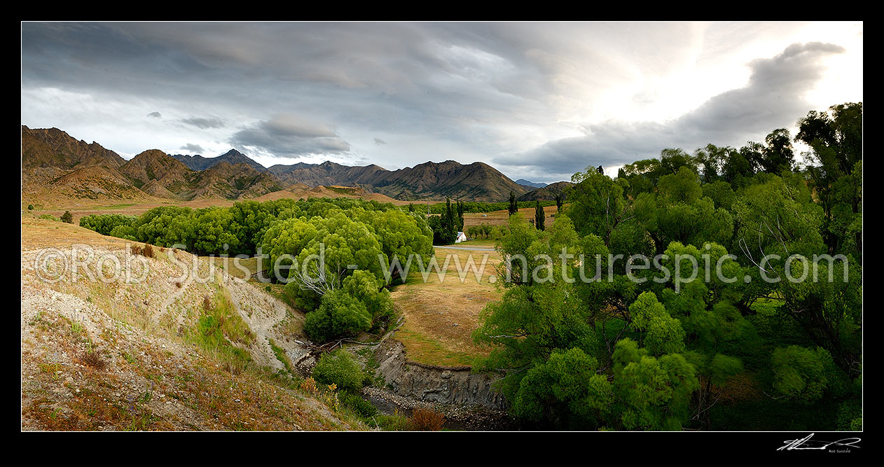 Image of Molesworth Cob Homestead, historic bulding in the Awatere River valley. Original Molesworth Homestead buillt in 1866. Turks Head left in panorama, Molesworth Station, Marlborough District, Marlborough Region, New Zealand (NZ) stock photo image