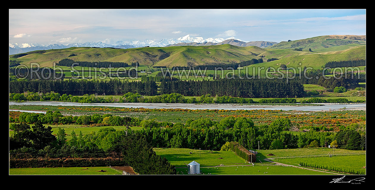 Image of Hurunui River and farmland near Domett, panorama with the Kaikoura Ranges and Mount Tapuae-o-Uenuku (centre) behind, Hurunui Mouth, Hurunui District, Canterbury Region, New Zealand (NZ) stock photo image