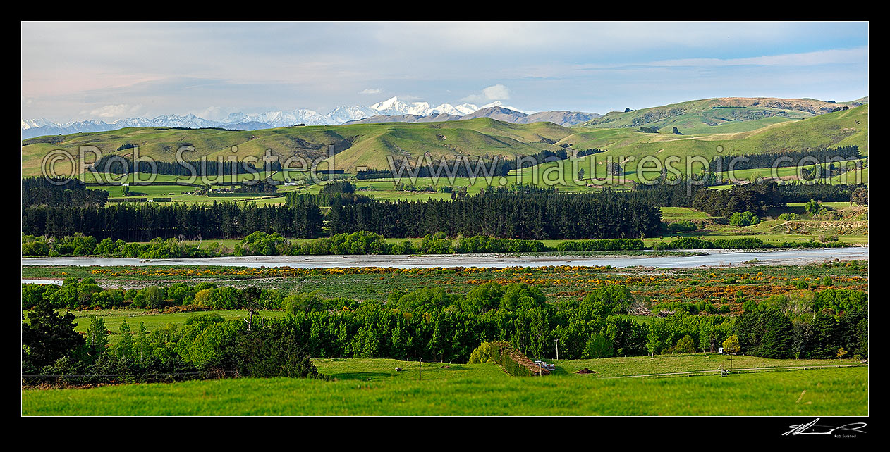 Image of Hurunui River and farmland near Domett, panorama with the Kaikoura Ranges and Mount Tapuae-o-Uenuku (centre) behind, Hurunui Mouth, Hurunui District, Canterbury Region, New Zealand (NZ) stock photo image