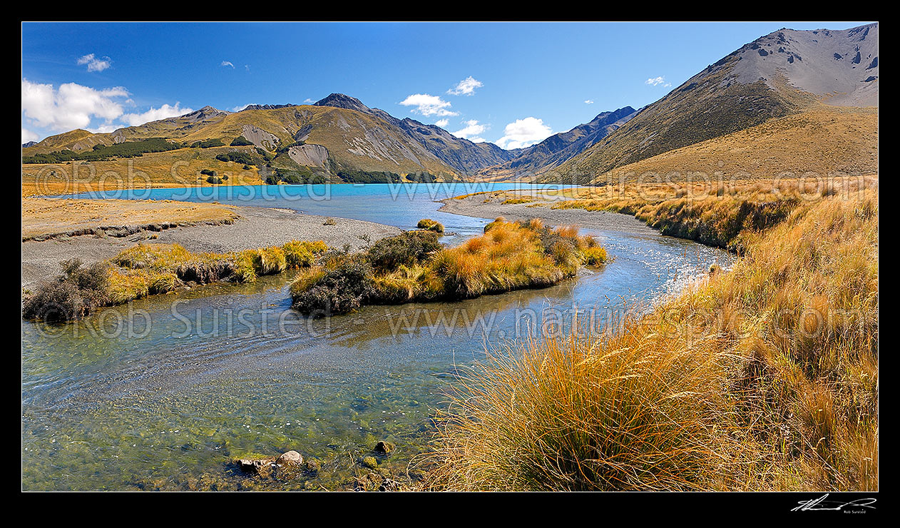 Image of Lake Tennyson draining into the Clarence River. Lake Tennyson Scenic Reserve. Saint James Range and Mount McCabe (1606m) centre left. Panorama, St James Station, Hurunui District, Canterbury Region, New Zealand (NZ) stock photo image