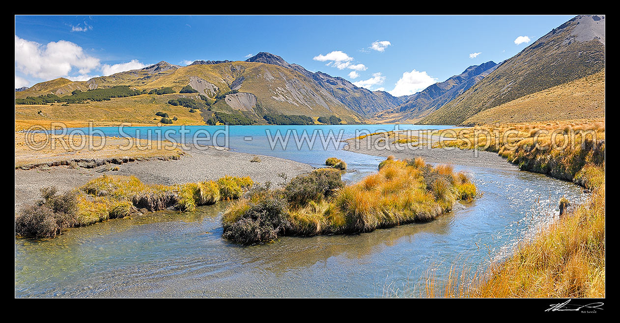 Image of Lake Tennyson draining into the Clarence River. Lake Tennyson Scenic Reserve. Saint James Range and Mount McCabe (1606m) centre left. Panorama, St James Station, Hurunui District, Canterbury Region, New Zealand (NZ) stock photo image