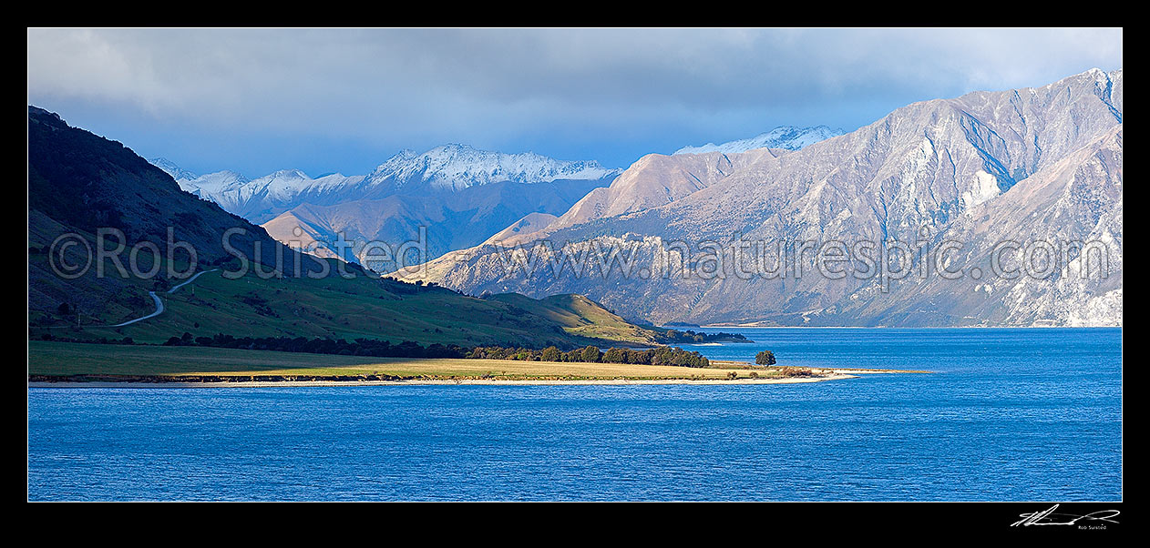 Image of Lake Hawea, looking past Bushy Point towards the Dingle Burn. Panorama, Lake Hawea, Otago, Queenstown Lakes District, Otago Region, New Zealand (NZ) stock photo image