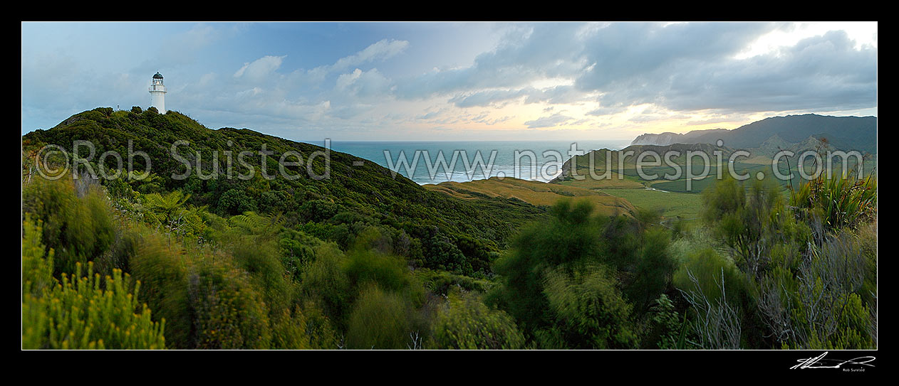 Image of East Cape lighthouse at dusk, Tunanui Stream and Waikori Bluff distant right. Panorama, East Cape, Gisborne District, Gisborne Region, New Zealand (NZ) stock photo image