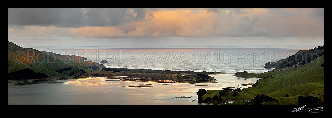 Image of Otago Peninsula, Allans Beach and Hoopers Inlet on a stormy winter evening. Panorama, Otago Peninsula, Dunedin City District, Otago Region, New Zealand (NZ) stock photo image