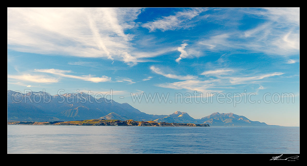 Image of Kaikoura Peninsula with Seaward Kaikoura Range and Mt ManaKau (2608m) at left, Mount Alexander (1197m, Puhipuhi Syncline visible) and Mt Batty (1195m) centre right. Panorama, Kaikoura, Kaikoura District, Canterbury Region, New Zealand (NZ) stock photo image