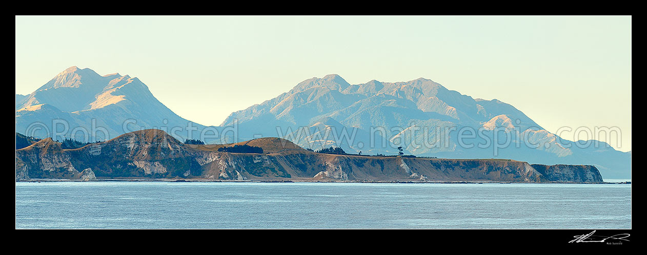 Image of Kaikoura Peninsula with Mount Alexander (1197m, Puhipuhi Syncline visible) left, and Mt Batty (1195m) centre. Panorama, Kaikoura, Kaikoura District, Canterbury Region, New Zealand (NZ) stock photo image