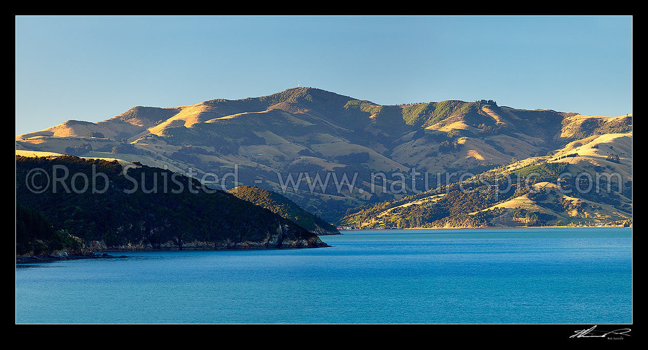 Image of Upper Akaroa Harbour with Onawe and Duvauchelle centre, with Mt Pearce (737m) high above. Banks Peninsula panorama, Akaroa, Christchurch City District, Canterbury Region, New Zealand (NZ) stock photo image