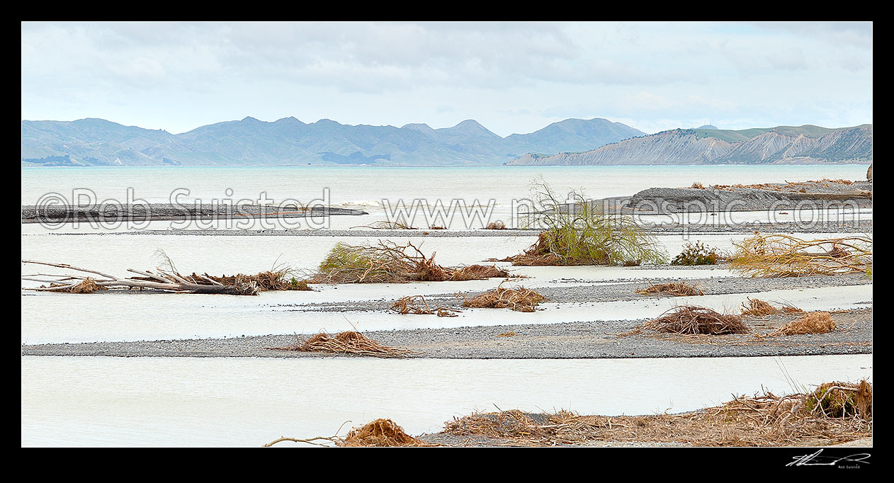 Image of Awatere River mouth and alluvial sand or gravel bars, with Clifford Bay and Lake Grassmere / Kapara Te Hau beyond. Panorama, Seddon, Marlborough District, Marlborough Region, New Zealand (NZ) stock photo image