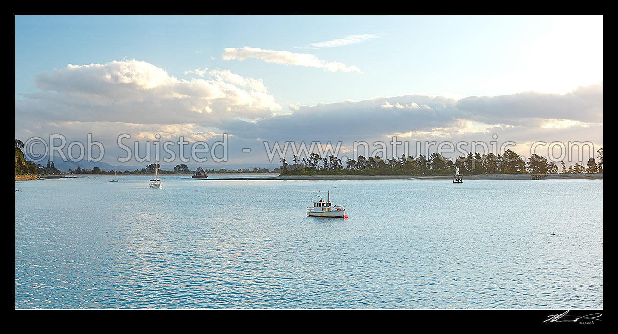 Image of Nelson waterfront with yachts moored infront of Tahunanui Beach, with Haulashore Island at right. Panorama, Nelson, Nelson City District, Nelson Region, New Zealand (NZ) stock photo image