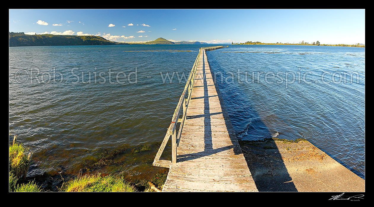 Image of Tokaanu Wharf, historic wharf built about 1870 for steamers servicing Lake Taupo, before roads were built, Tokaanu, Taupo District, Waikato Region, New Zealand (NZ) stock photo image