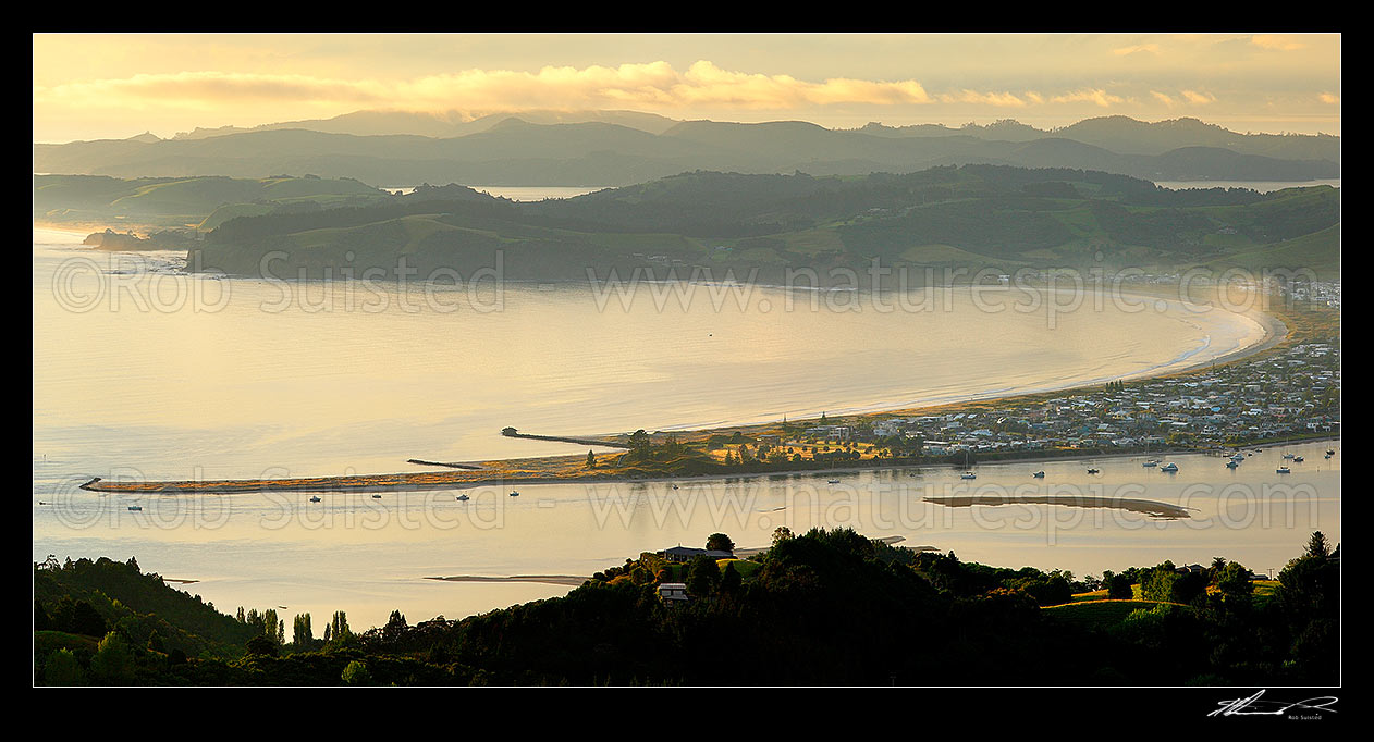 Image of Omaha Beach and Bay. Whangateau Harbour entrance with Tawharanui Peninsula and Kawau Island beyond, at dawn, Leigh, Rodney District, Auckland Region, New Zealand (NZ) stock photo image