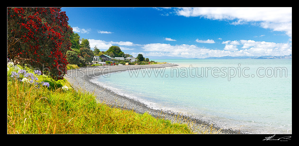 Image of Hauraki Gulf houses nestled on the Waharau shore near Wharekawa. Coromandel Ranges distant. Panorama, Kaiaua, Franklin District, Waikato Region, New Zealand (NZ) stock photo image