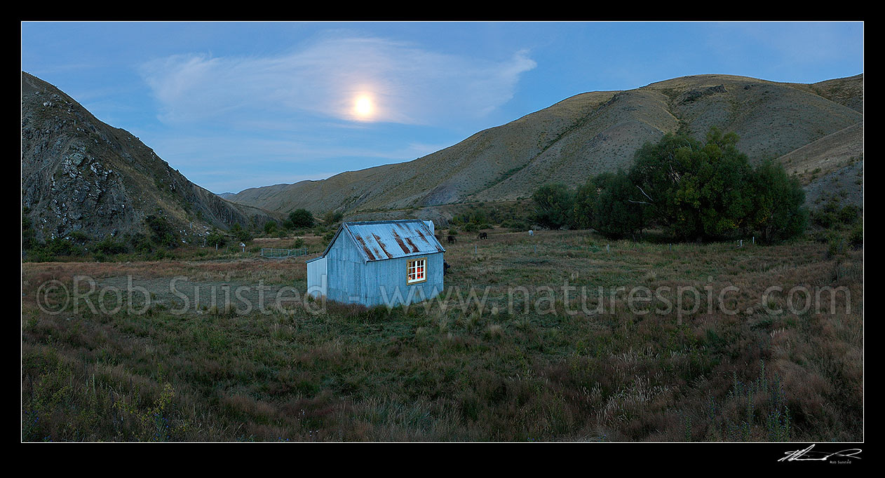 Image of Yarra Hut moonrise, an over 100 year old historic musterers hut, in the Yarra River. Panorama, Molesworth Station, Marlborough District, Marlborough Region, New Zealand (NZ) stock photo image