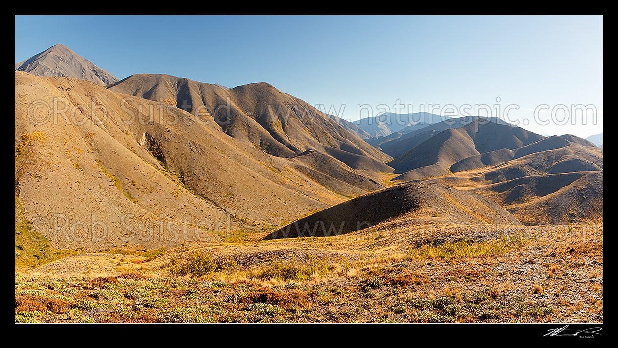 Image of Dillion River headwaters near Carters Saddle (1175m), with Mt Dillion Cone (2173m) far left. Panorama, Molesworth Station, Marlborough District, Marlborough Region, New Zealand (NZ) stock photo image