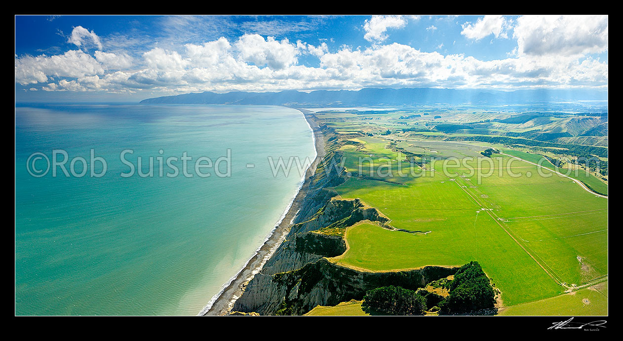 Image of Palliser Bay and Whangaimoana panorama, looking towards Lake Ferry (Onoke), Remutaka (Rimutaka) Range and Turakirae Head (left), Palliser Bay, South Wairarapa District, Wellington Region, New Zealand (NZ) stock photo image