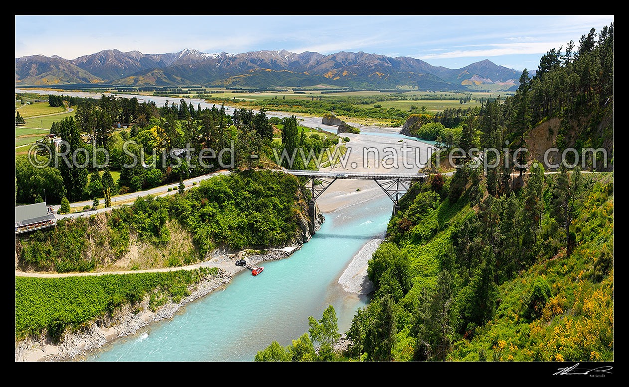 Image of Waiau Ferry Bridge crossing the Waiau River, with the Hanmer Range behind. Panorama, Hanmer Springs, Hurunui District, Canterbury Region, New Zealand (NZ) stock photo image