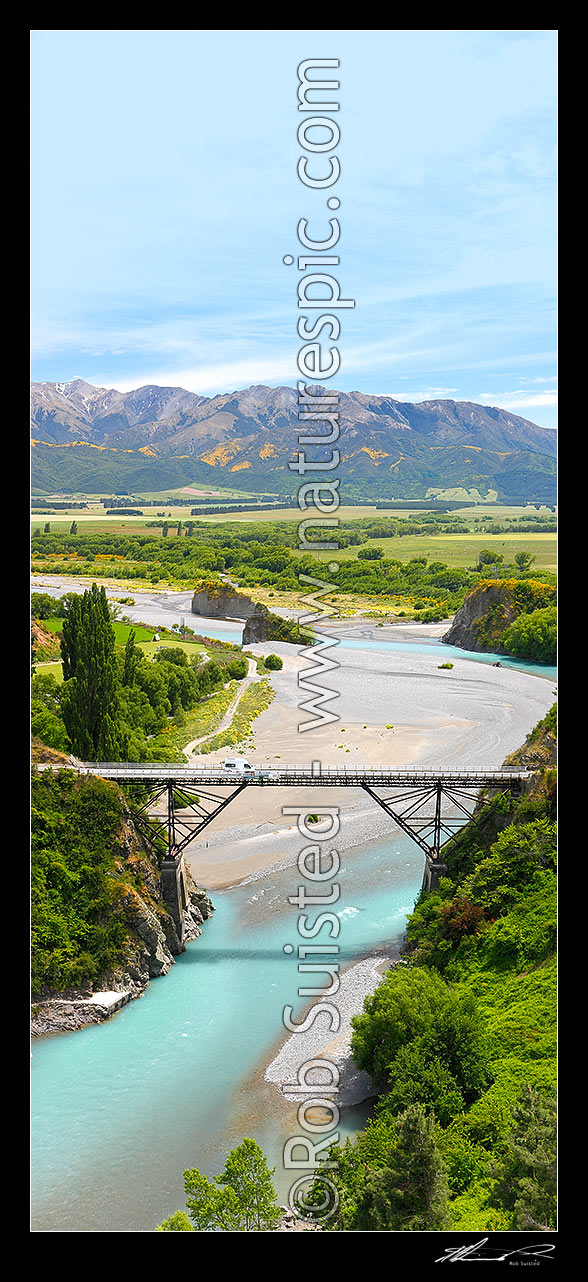 Image of Waiau Ferry Bridge crossing the Waiau River, with the Hanmer Range behind. Vertical panorama, Hanmer Springs, Hurunui District, Canterbury Region, New Zealand (NZ) stock photo image